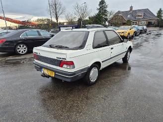 krockskadad bil auto Peugeot 309 1.4 1992/7