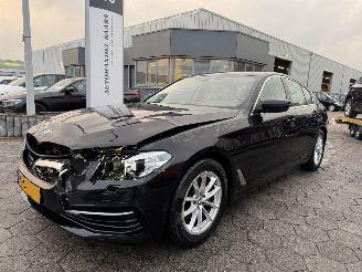 damaged passenger cars BMW 5-serie 520i High Executive 2018/3