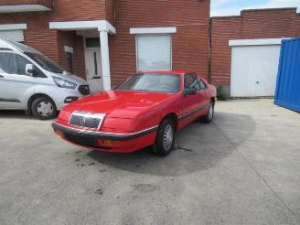 Damaged car Chrysler Le-baron  1992/5