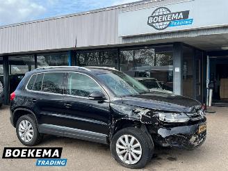 damaged passenger cars Volkswagen Tiguan 1.4 TSI R-Line DSG Dynaudio Stoelverwarming Climate Cruise 2014/1