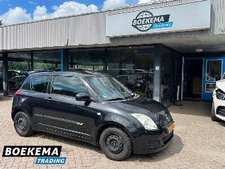 Vaurioauto  passenger cars Suzuki Swift 1.3 Base Airco 3-Deurs 2009/10