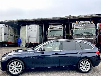 Schadeauto BMW 3-serie 320i 184pk 8-traps aut High Executive - nap - xenon - beige leer - stoelverw - navi - pdc - elektr klep 2014/1