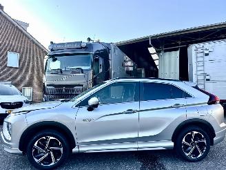 Schadeauto Mitsubishi Eclipse Cross 2.4 PHEV Plug-In Hybr aut 4WD Exec - nap - 1e eig - xenon - 360cam - front + line + side assist - stuurverw 2023/3