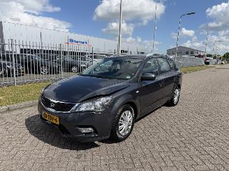 Schadeauto Kia Cee d Sporty wagon 1.4 CVVT 77Kw AIRCO 2012/2