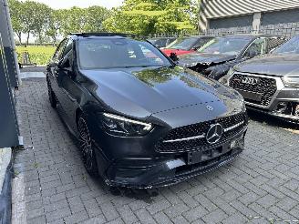 skadebil auto Mercedes C-klasse 180 AMG LINE / PANO / 360CAM / LED BEAM / NEW CAR! 2022/12