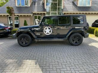 Voiture accidenté Jeep Wrangler Unlimited 2.8 CRD SAHARA 2010/1