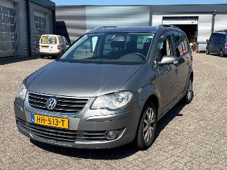 Vaurioauto  passenger cars Volkswagen Touran 1.4 16V TSI 140 MPV  Benzine 1.390cc 103kW (140pk) FWD 2006-02/2010-05 (1T1; 1T2) BMY 2006/12